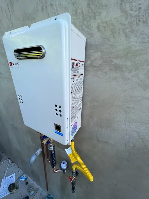 Tankless water heater installation for McIntosh Village homes